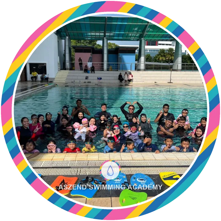 Aszend Swimming Academy swimmers, kids and coaches together in the pool after a class