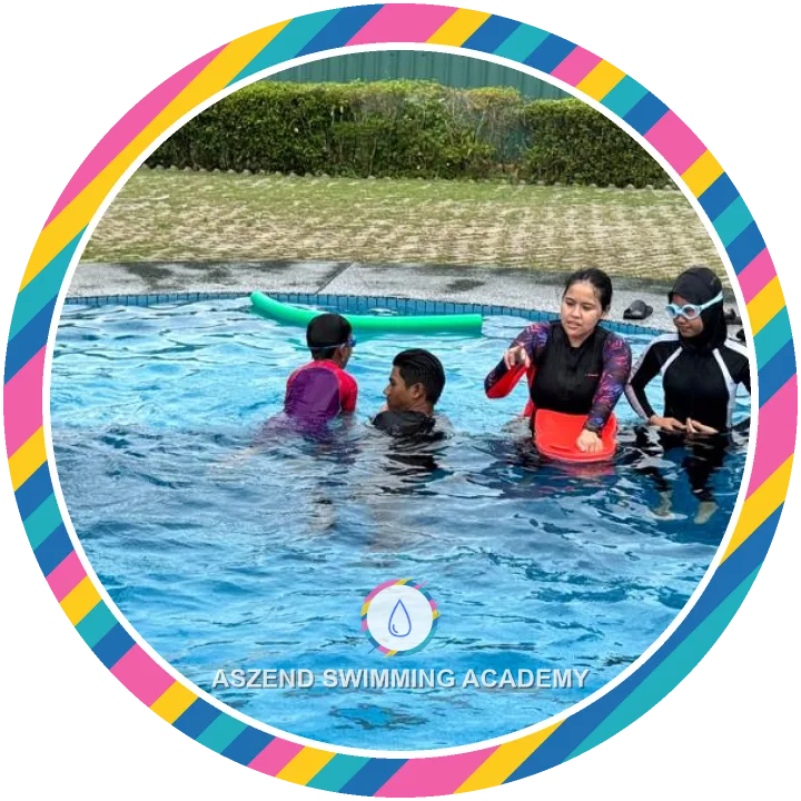 Coaches teaching kids during an Aszend Swimming Academy swimming class