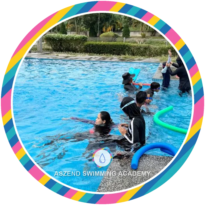 Kids learning to swim with floats and coaches in an Aszend swimming lesson